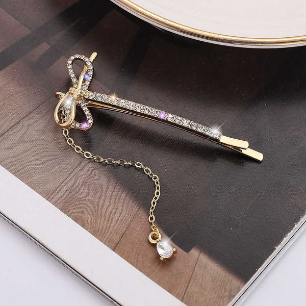 style hairpin shining rhinestone bow edge clip tassel chain clip net red hair clip, Golden;silver
style hairpin shining rhinestone bow edge clip tassel chain clip net red hair clip, Golden;silver
