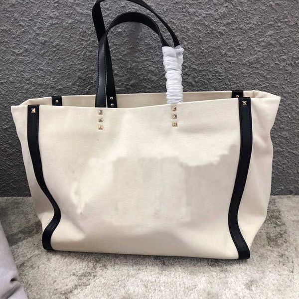 women single shoulder handbag large tote bags canvas shopping bag classic rivet inlay pouch
women single shoulder handbag large tote bags canvas shopping bag classic rivet inlay pouch