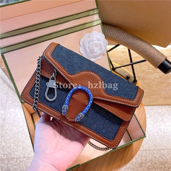 diony sus super mini bag dark blue ivory eco washed organic jacquard denim chain canvas tiger head closure shoulder bags
diony sus super mini bag dark blue ivory eco washed organic jacquard denim chain canvas tiger head closure shoulder bags