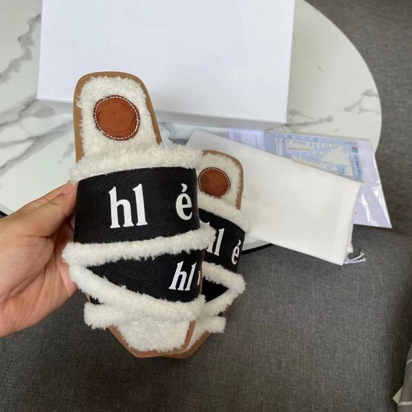 autumn and winter new flat bottomed lamb wool slippers flip flops versatile casual female letter shoes for external, Black
autumn and winter new flat bottomed lamb wool slippers flip flops versatile casual female letter shoes for external, Black