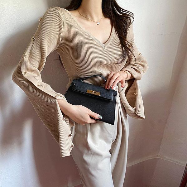 women's sweaters autumn winter v neck ribbed sweater women 2022 fashion buttoned long sleeve office knitted pullover jumper, White;black
women's sweaters autumn winter v neck ribbed sweater women 2022 fashion buttoned long sleeve office knitted pullover jumper, White;black
