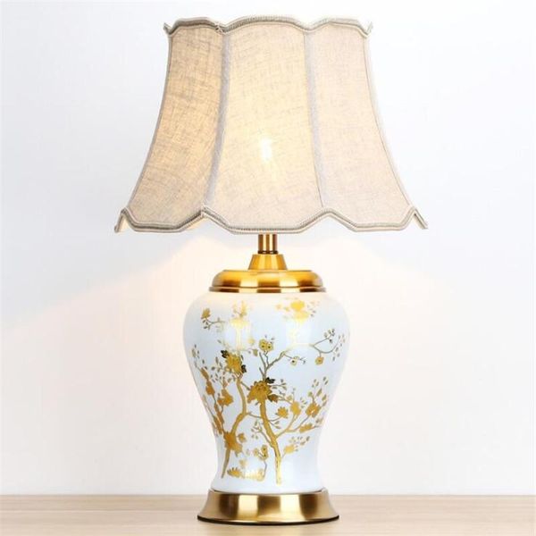table lamps luxurious gold painted ceramic lamp for foyer bed room apartment europe modern desk light h 65cm 1933
table lamps luxurious gold painted ceramic lamp for foyer bed room apartment europe modern desk light h 65cm 1933