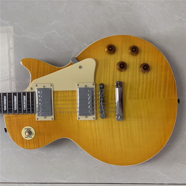 electric guitar, yellow binding, tobacco burst maple solid mahogany body guitar
electric guitar, yellow binding, tobacco burst maple solid mahogany body guitar