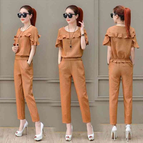 summer lotus leaf chiffon solid womens tracksuits two piece set short sleeve loose casual wide leg pants suits y659, Gray
summer lotus leaf chiffon solid womens tracksuits two piece set short sleeve loose casual wide leg pants suits y659, Gray