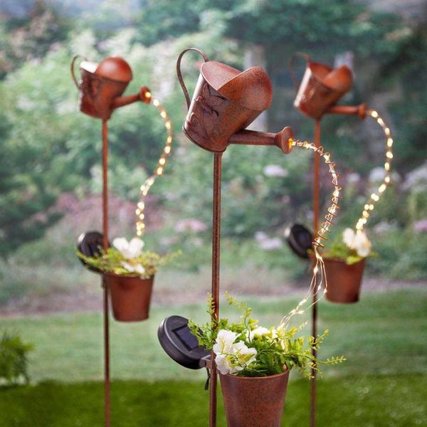 metal watering can solar garden landscape path string lights yard stake with planter for yard lawn art outdoor home decorations
metal watering can solar garden landscape path string lights yard stake with planter for yard lawn art outdoor home decorations