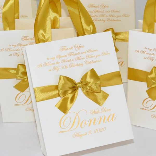 gift wrap personalized elegant ivory & gold birthday party bags for your guests with satin ribbon bow and custom name anniversary
gift wrap personalized elegant ivory & gold birthday party bags for your guests with satin ribbon bow and custom name anniversary