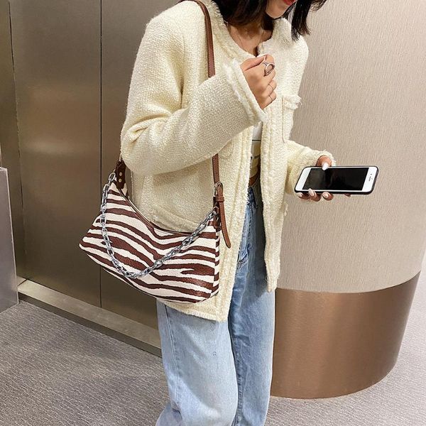 zebra printed crossbody bags pu leather small summer lady shoulder handbags female simple totes for women 2021 trend
zebra printed crossbody bags pu leather small summer lady shoulder handbags female simple totes for women 2021 trend