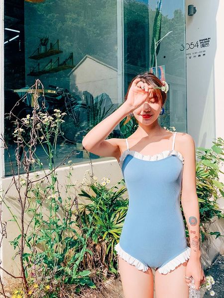 one-piece suits 2021 korean women one piece swimwear solid blue adjustable sling bandeau cross strap back ruffle neckline trim backless suit
one-piece suits 2021 korean women one piece swimwear solid blue adjustable sling bandeau cross strap back ruffle neckline trim backless suit