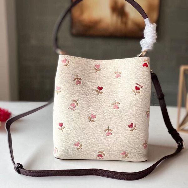 coa koujia printing embossed bucket full leather style portable one shoulder messenger 2021 new bag
coa koujia printing embossed bucket full leather style portable one shoulder messenger 2021 new bag