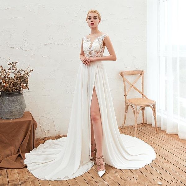 2021 new modest lace chiffon wedding es with high split sleeveless appliques buttons back illusion country bridal gowns vestido 8lfr, White
2021 new modest lace chiffon wedding es with high split sleeveless appliques buttons back illusion country bridal gowns vestido 8lfr, White