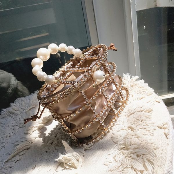 simple birdcage handbag french niche pearl bags fashion temperament straddle women's small square bag
simple birdcage handbag french niche pearl bags fashion temperament straddle women's small square bag