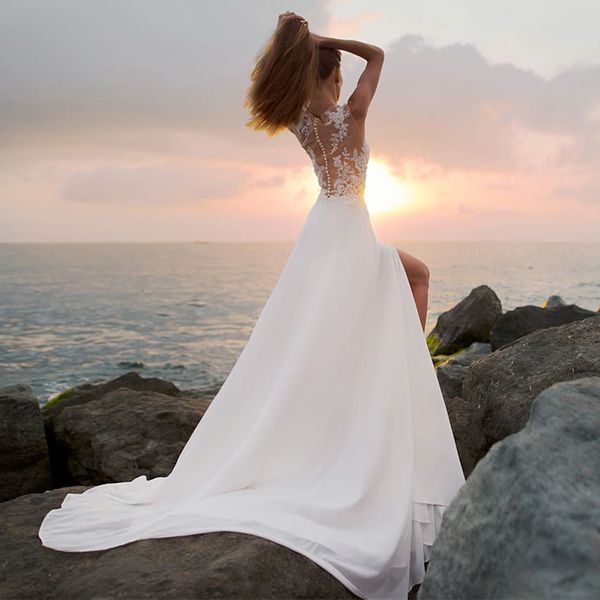 charming wedding new es 2021 boho slit bridal gown o-neck sleeveless applique lace robe de mariage mggf, White
charming wedding new es 2021 boho slit bridal gown o-neck sleeveless applique lace robe de mariage mggf, White