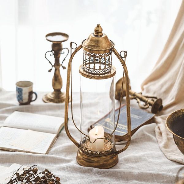 retro iron art lantern glass candlestick american courtyard romantic candle holder metal outdoor hanging home decoration c6h
retro iron art lantern glass candlestick american courtyard romantic candle holder metal outdoor hanging home decoration c6h