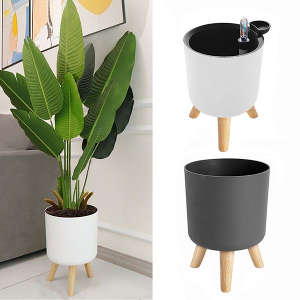 modern white plant pots with wooden legs holder balcony garden floor standing potted flower pot for planter green plant flower
modern white plant pots with wooden legs holder balcony garden floor standing potted flower pot for planter green plant flower