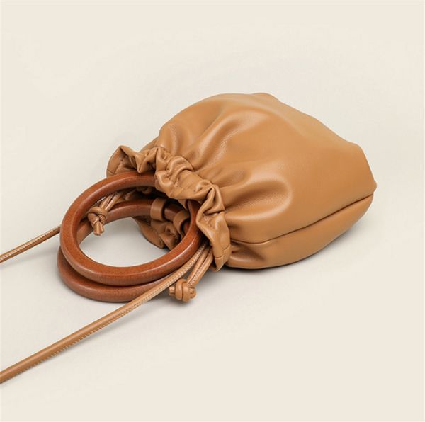 women's shopping bags ring wooden handle handbag casual soft leather fold bucket bag new shoulder messenger crossbody female purses
women's shopping bags ring wooden handle handbag casual soft leather fold bucket bag new shoulder messenger crossbody female purses