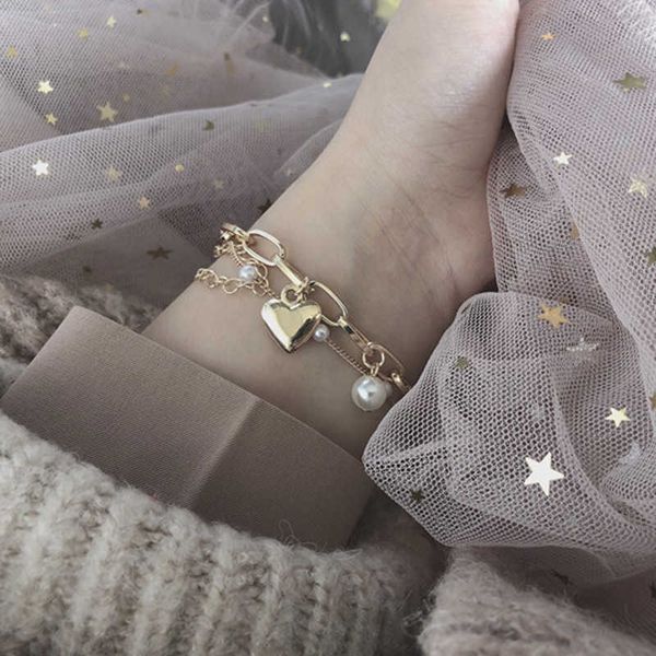 double layer love pearl bracelet lovely sweet girl bracelet temperament versatile metal peach heart pendant, Golden;silver
double layer love pearl bracelet lovely sweet girl bracelet temperament versatile metal peach heart pendant, Golden;silver