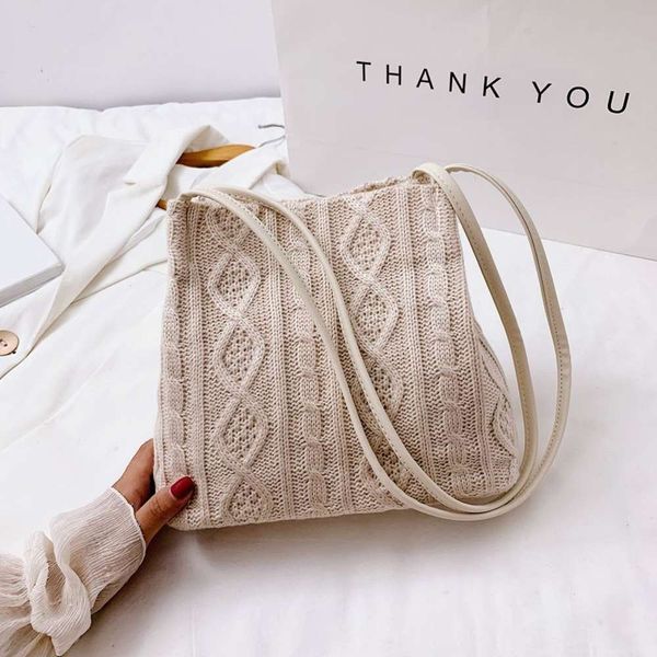 2020 new wool knitted net red fashion woven shoulder simple handbag bucket tote women's bag
2020 new wool knitted net red fashion woven shoulder simple handbag bucket tote women's bag