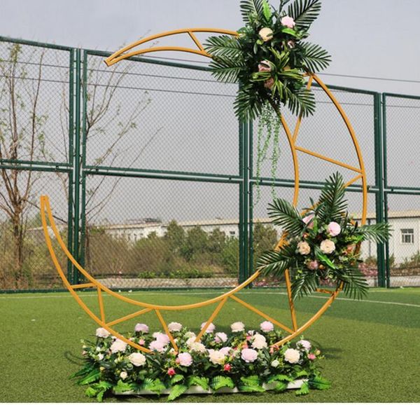party decoration wedding scene moon arch stage background sen arrangement 
party decoration wedding scene moon arch stage background sen arrangement