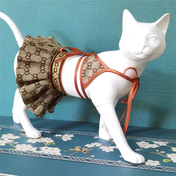pet bikini set dog cat bra skirt designer lace up bras puppy dog cats clothes 
pet bikini set dog cat bra skirt designer lace up bras puppy dog cats clothes