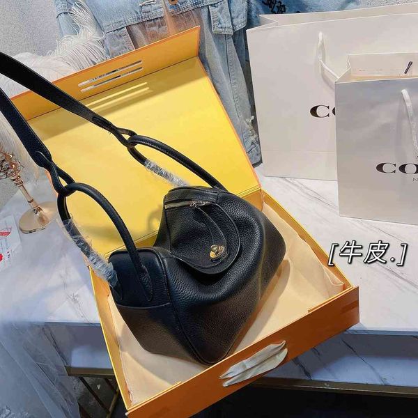 design s new women's cowhide litchi pattern one shoulder hand diagonal bag