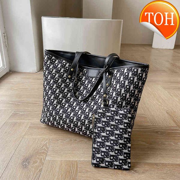 large capacity canvas women's summer letter 2021 new advanced sense hand simple atmosphere fantote bag fashion
large capacity canvas women's summer letter 2021 new advanced sense hand simple atmosphere fantote bag fashion