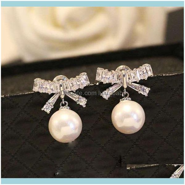 dangle jewelrydangle & chandelier korean temperament simple zircon bow pearl earrings hypoallergenic s925 sier ladies jewelry drop delivery, Silver
dangle jewelrydangle & chandelier korean temperament simple zircon bow pearl earrings hypoallergenic s925 sier ladies jewelry drop delivery, Silver
