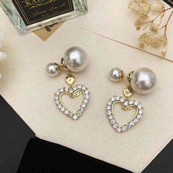 70% off front and back pearl love letter love heart-shaped two wearing shows temperament s925 silver needle earrings, Golden
70% off front and back pearl love letter love heart-shaped two wearing shows temperament s925 silver needle earrings, Golden