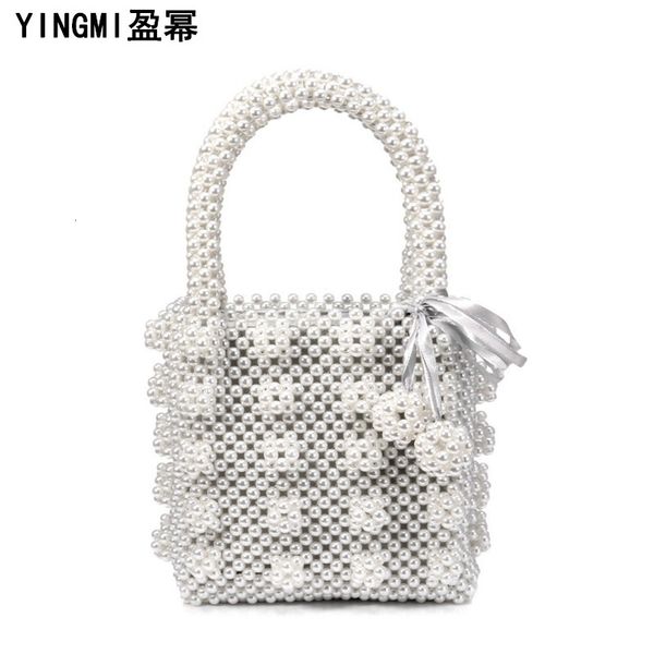 evening bag fashion pearl hand women's ins net red small crowd beaded 
evening bag fashion pearl hand women's ins net red small crowd beaded