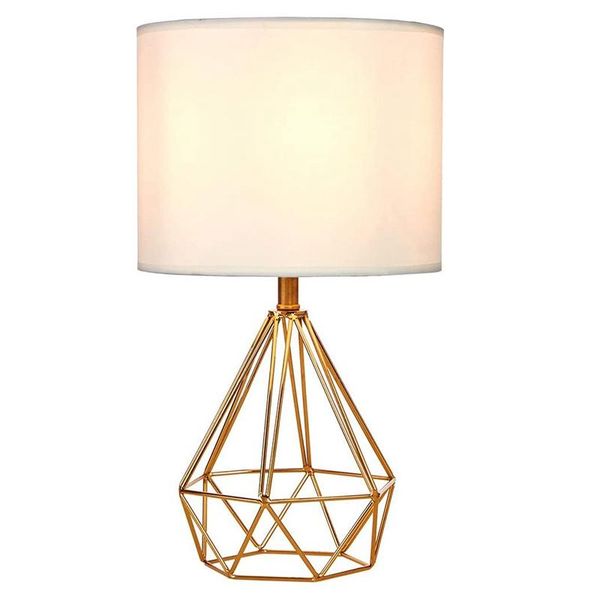 table lamps modern style golden hollowed out base bedside living room bedroom lamp, desk lamp with white fabric shade
table lamps modern style golden hollowed out base bedside living room bedroom lamp, desk lamp with white fabric shade