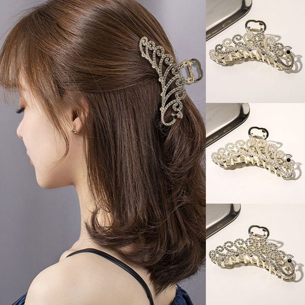 eelgant claw clips for women pearl rhinestone metal clip ladies peacock tail fish bone shape large hair claw, Slivery;white
eelgant claw clips for women pearl rhinestone metal clip ladies peacock tail fish bone shape large hair claw, Slivery;white