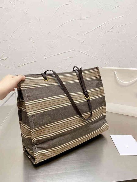 large capacity canvas bags tote luxury stripes simple handbag leather designer female one-shoulder shopping adjustable hand strap 220302
large capacity canvas bags tote luxury stripes simple handbag leather designer female one-shoulder shopping adjustable hand strap 220302
