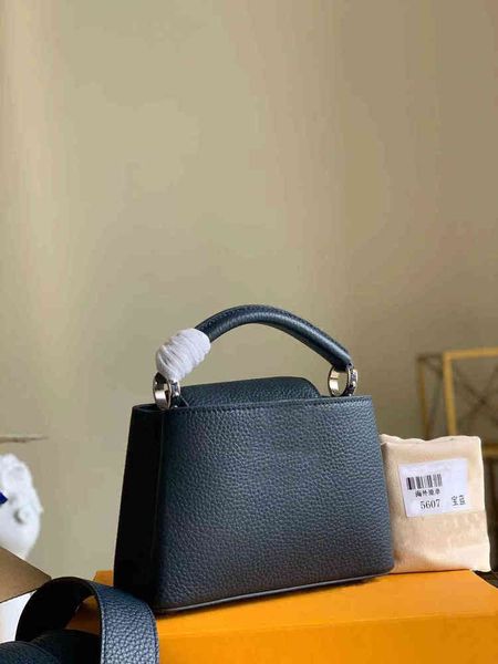 m56770 capucin mini handbag taurillon leather in atlantic dark blue color classic women tot carried by hand or over the shoulder strap
m56770 capucin mini handbag taurillon leather in atlantic dark blue color classic women tot carried by hand or over the shoulder strap