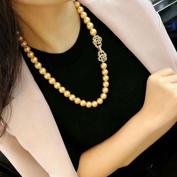 chains hand knotted 10mm gold shell pearl necklace micro inlaid zircon clasp sweater chain long 70cm fashion jewelry, Silver
chains hand knotted 10mm gold shell pearl necklace micro inlaid zircon clasp sweater chain long 70cm fashion jewelry, Silver