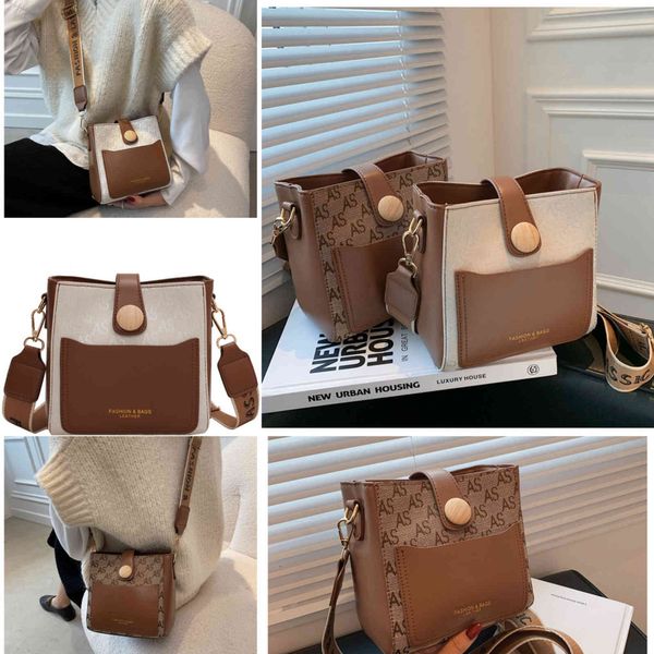design fashion versatile wide shoulder strap bucket small bag women's new minority portable sling shoulder messenger purses outlet
design fashion versatile wide shoulder strap bucket small bag women's new minority portable sling shoulder messenger purses outlet