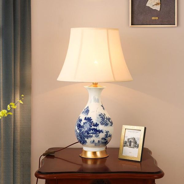 modern simple blue and white porcelain garden fashion all copper dimming bedroom study bedside lamp
modern simple blue and white porcelain garden fashion all copper dimming bedroom study bedside lamp