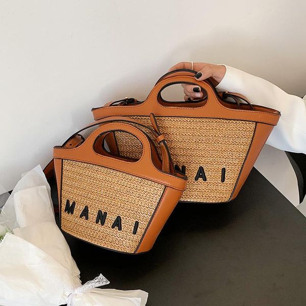 cross body women's bag 2021 early spring fashion straw splicing hand messenger mini vegetable basket
cross body women's bag 2021 early spring fashion straw splicing hand messenger mini vegetable basket