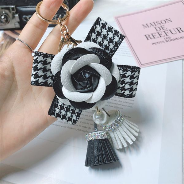 character bowknot key chain lady fashion camellia with diamond tassel bag pendant new, Silver
character bowknot key chain lady fashion camellia with diamond tassel bag pendant new, Silver
