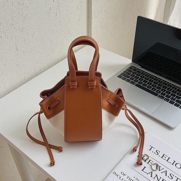 evening bags bag women's fashion canvas one-shoulder slant creative stitching bucket handbags
evening bags bag women's fashion canvas one-shoulder slant creative stitching bucket handbags