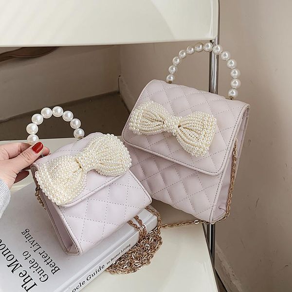 cross body pearl handle crossbody bags for women 2021 designer handbags female beading bow party small shoulder messenger bag
cross body pearl handle crossbody bags for women 2021 designer handbags female beading bow party small shoulder messenger bag