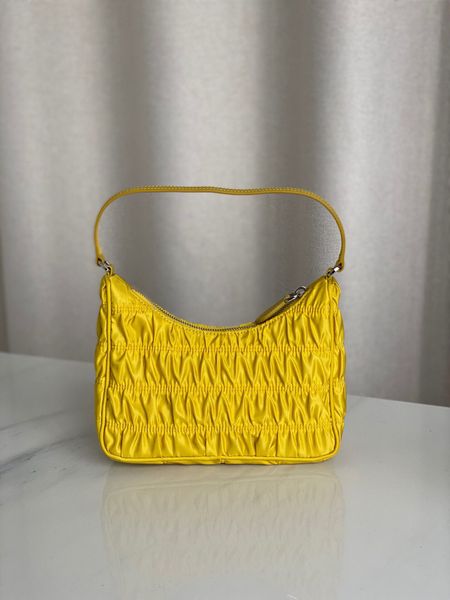 new nylon triangle mark hobo pleated underarm bag ins internet celebrity kendall jenner portable hand-carrying shoulder bag
new nylon triangle mark hobo pleated underarm bag ins internet celebrity kendall jenner portable hand-carrying shoulder bag