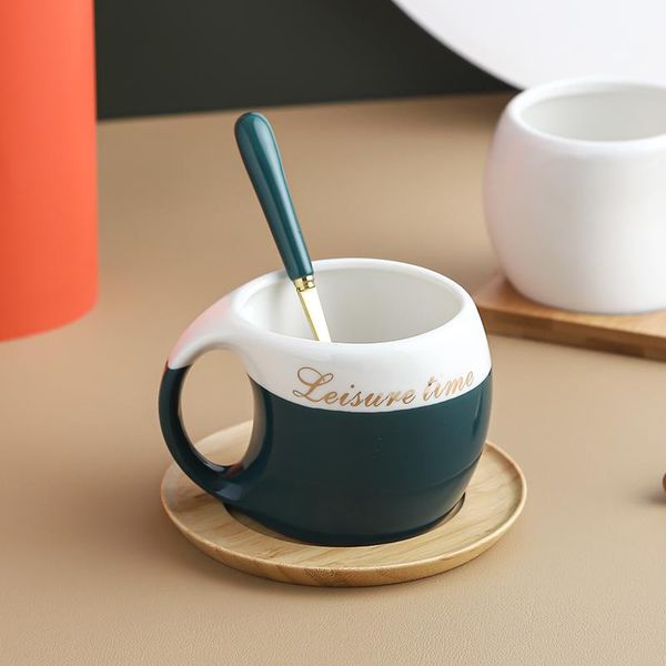 mugs simple ceramic water cup mug with cushion spoon household milk tea creative personality office coffee set
mugs simple ceramic water cup mug with cushion spoon household milk tea creative personality office coffee set