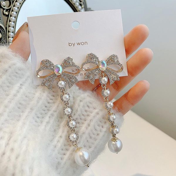 stud 2021fashion personality full diamond bow long tassel earrings net red temperament exaggerated retro pearl, Golden;silver
stud 2021fashion personality full diamond bow long tassel earrings net red temperament exaggerated retro pearl, Golden;silver