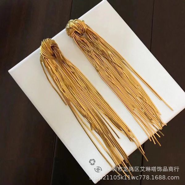 fashion designer new jewelry brass plated 24k gold flow soda knot long earrings style fashionable show, Golden
fashion designer new jewelry brass plated 24k gold flow soda knot long earrings style fashionable show, Golden