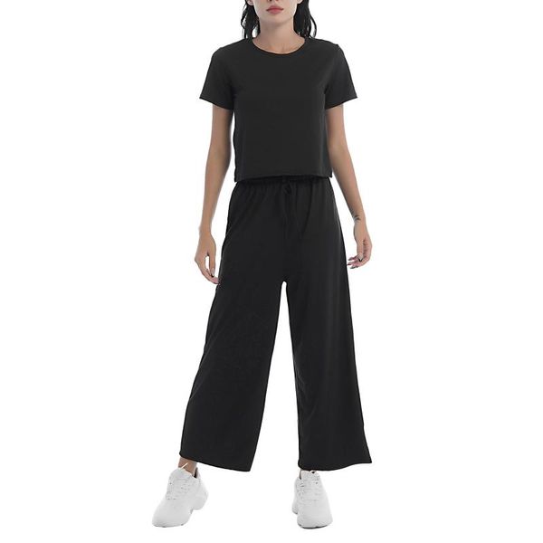 yoga outfit women pure color summer casual suit short sleeves cropped t-shirt and elastic waist loose pants set fitness gym sportswear
yoga outfit women pure color summer casual suit short sleeves cropped t-shirt and elastic waist loose pants set fitness gym sportswear