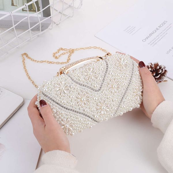 new style trend sweet pearl embroidery small square cross temperament dinner bag handbag
new style trend sweet pearl embroidery small square cross temperament dinner bag handbag
