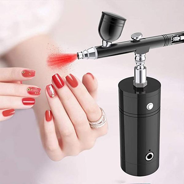 professional spray guns portable handheld airbrush gun cordless set is suitable for cosmetics, tattoos, nail art, facial paint, cake decorat
professional spray guns portable handheld airbrush gun cordless set is suitable for cosmetics, tattoos, nail art, facial paint, cake decorat