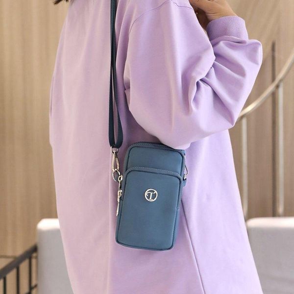 cell phone pouches women handbag crossbody bag fashion shoulder pocket small tribal flap multi-layer nylon cloth mobile pouch
cell phone pouches women handbag crossbody bag fashion shoulder pocket small tribal flap multi-layer nylon cloth mobile pouch