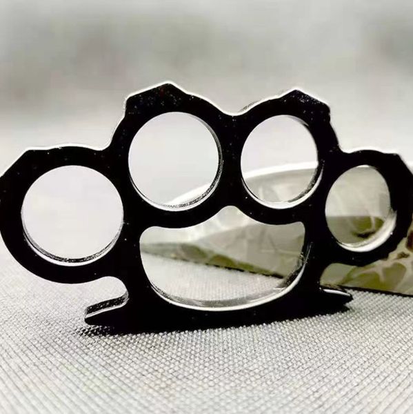 boxing set legal self-defense weapon punch round head iron four finger tiger hand clasp fist buckle defense tiger ring finger clasp hand8555
boxing set legal self-defense weapon punch round head iron four finger tiger hand clasp fist buckle defense tiger ring finger clasp hand8555