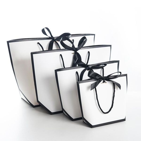 large size gift box packaging gold handle paper gift bags kraft paper with handles wedding baby shower birthday party favor
large size gift box packaging gold handle paper gift bags kraft paper with handles wedding baby shower birthday party favor