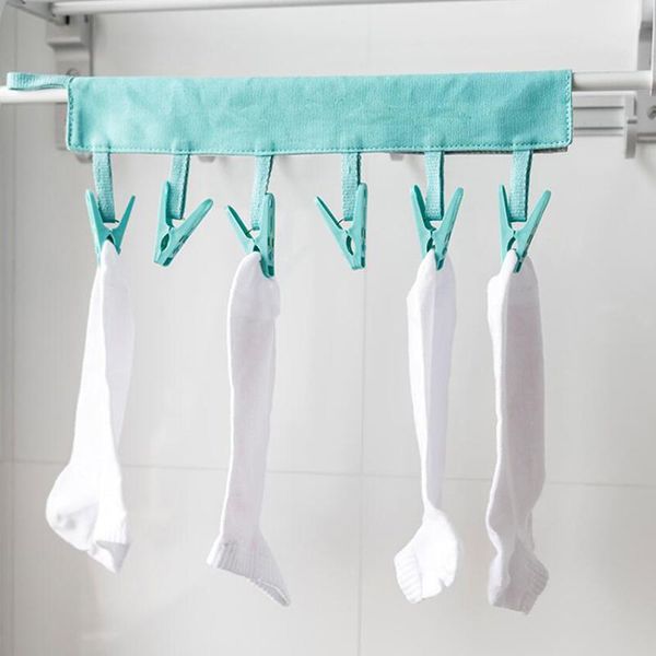 1pcs multifunction cloth hanger clips clothespin travel supplies foldable clothes rack drying cloth hanger socks drying racks
1pcs multifunction cloth hanger clips clothespin travel supplies foldable clothes rack drying cloth hanger socks drying racks